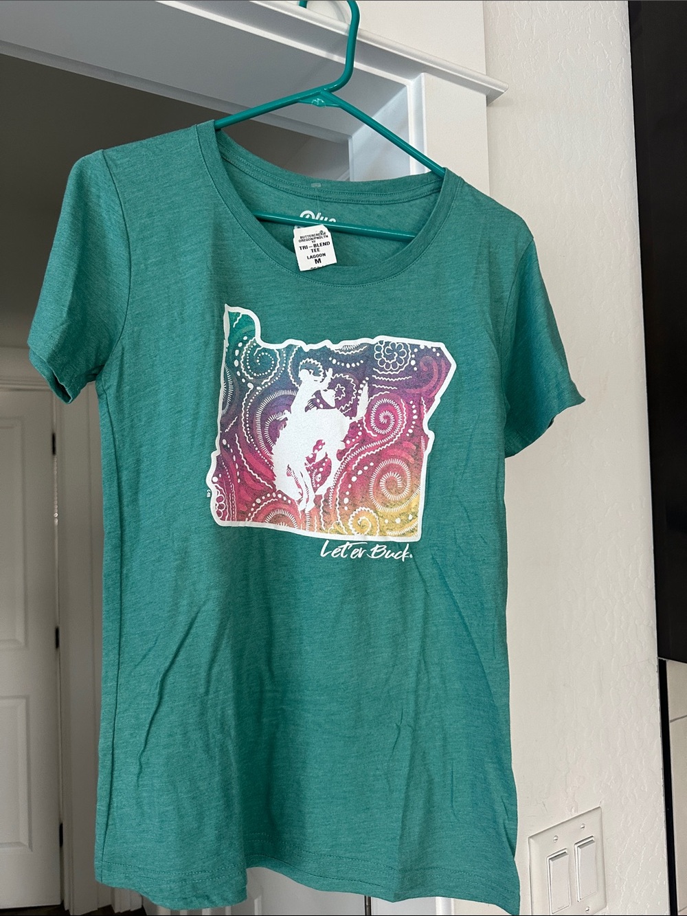 Let’er Buck Women's Short Sleeve Tee with Oregon Pendleton Rodeo Graphic